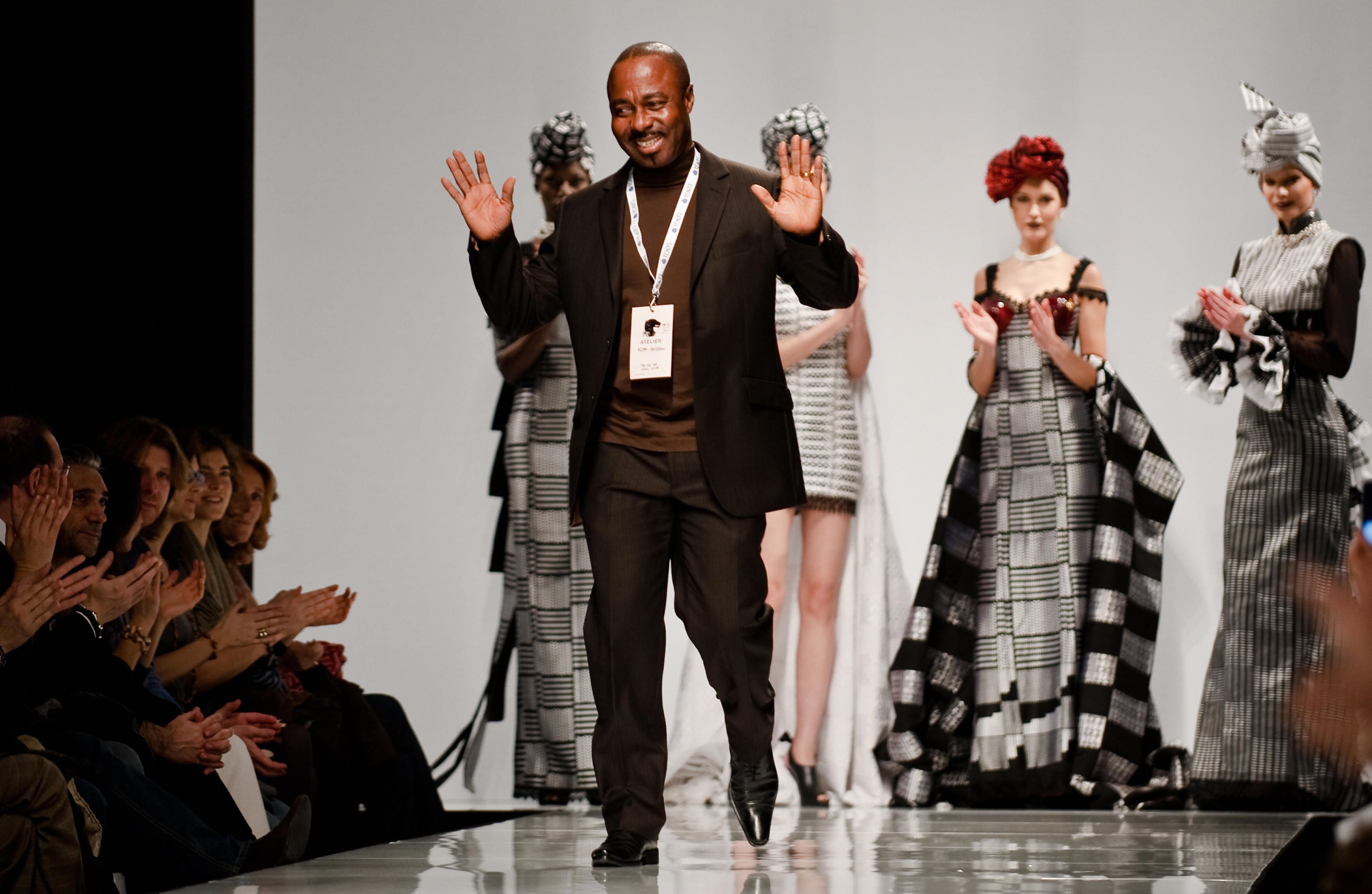 Ghanaian designer Kofi Ansah at the end of one of his shows in 2009
