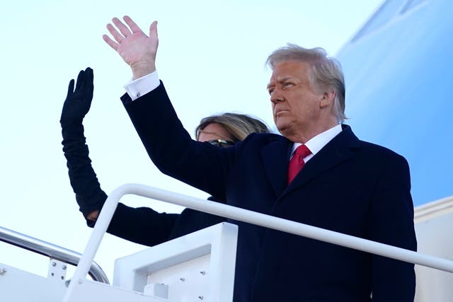 <p>Goodbye, for now: Donald and Melania Trump board Air Force One on Wednesday</p>