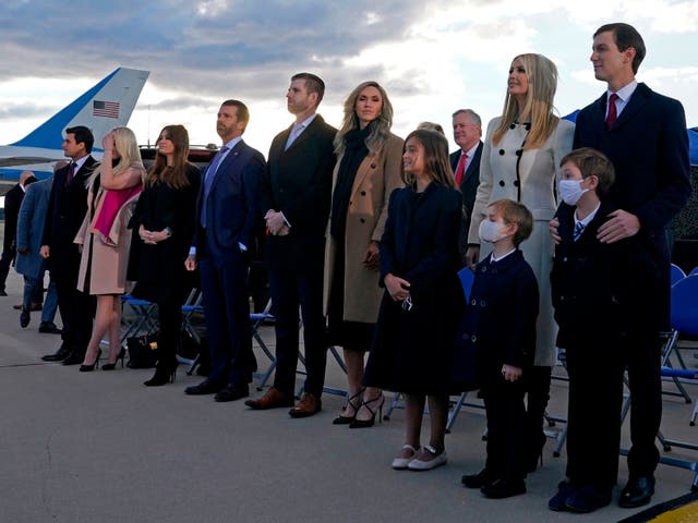 Ivanka Trump, Eric Trump, Donald Trump Jr, and Tiffany Trump stand with their respective partners on the tarmac at Joint Base Andrews in Maryland as they arrive for Donald Trump’s departure on 20 January 2021