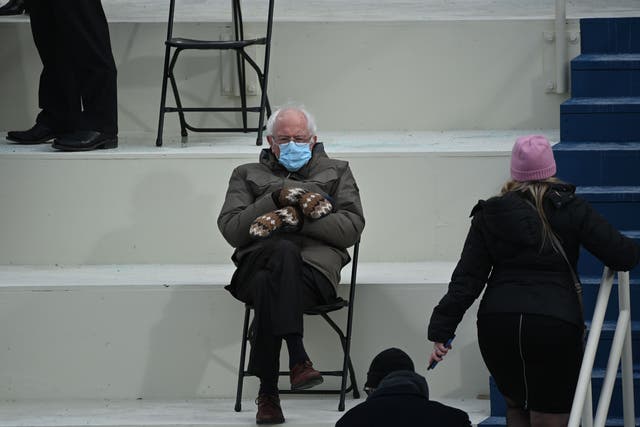 <p>Former presidential candidate, Senator Bernie Sanders (D-Vermont) sits in the bleachers on Capitol Hill before Joe Biden is sworn in as the 46th US President on 20 January 2021, at the US Capitol in Washington, DC</p>