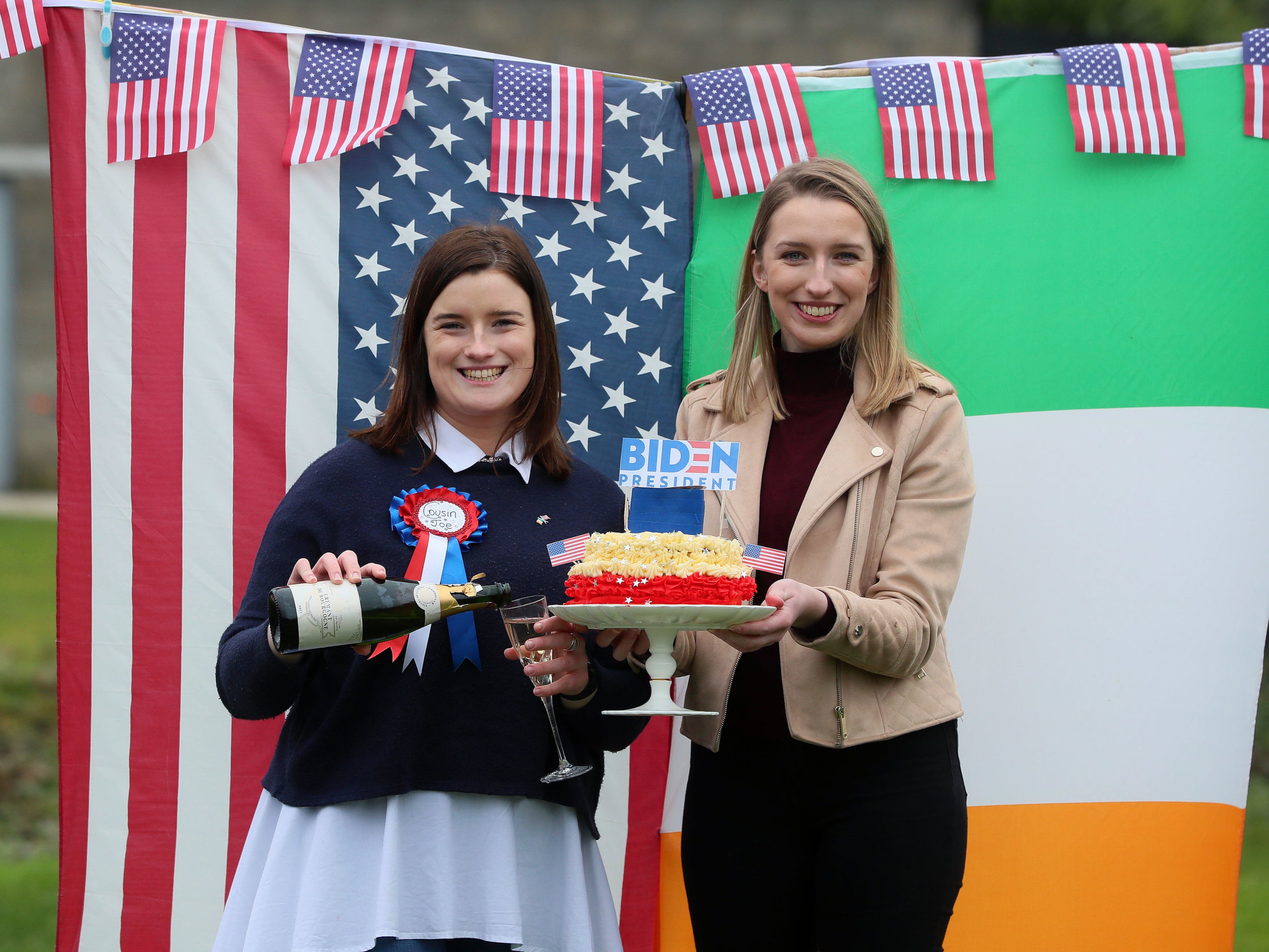 Fifth cousins of Mr Biden, Andrea McKevitt (left) and her sister Ciara, celebrated with champagne and homemade cake