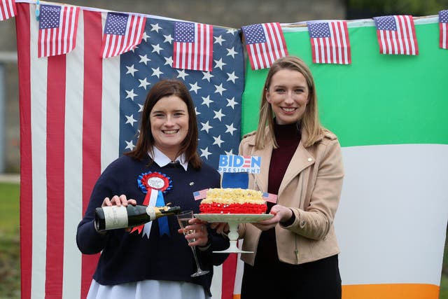 Fifth cousins of Mr Biden, Andrea McKevitt (left) and her sister Ciara, celebrated with champagne and homemade cake