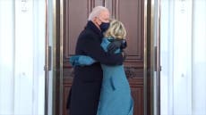 Joe Biden walks hand-in-hand with family to White House