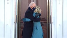 Joe Biden walks hand in hand with family to White House