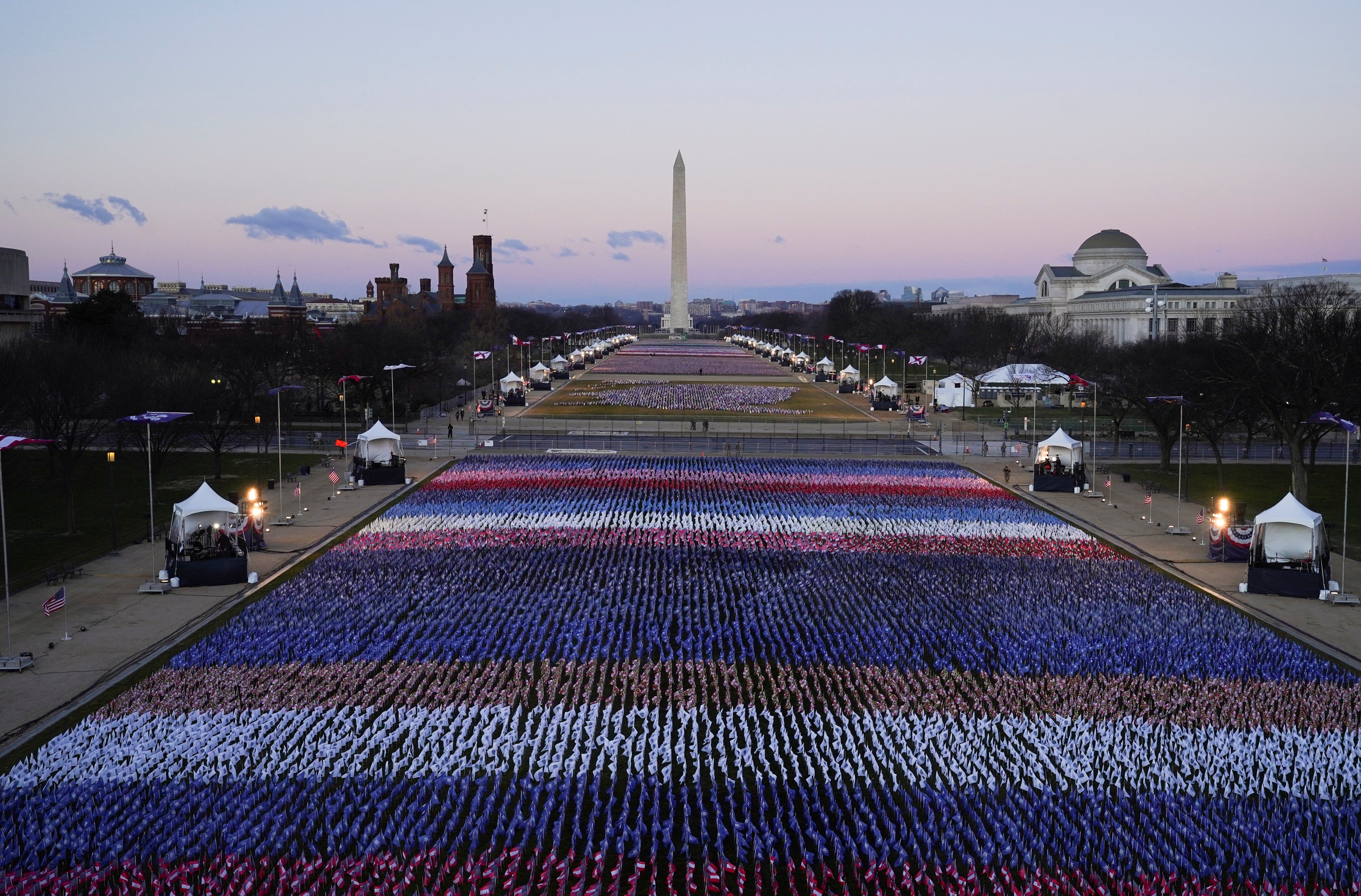 The ‘Field of Flags’ and the Washington Monument are seen on the National Mall in front of the Capitol building
