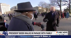 Joe Biden fist-bumps Al Roker during inaugural parade