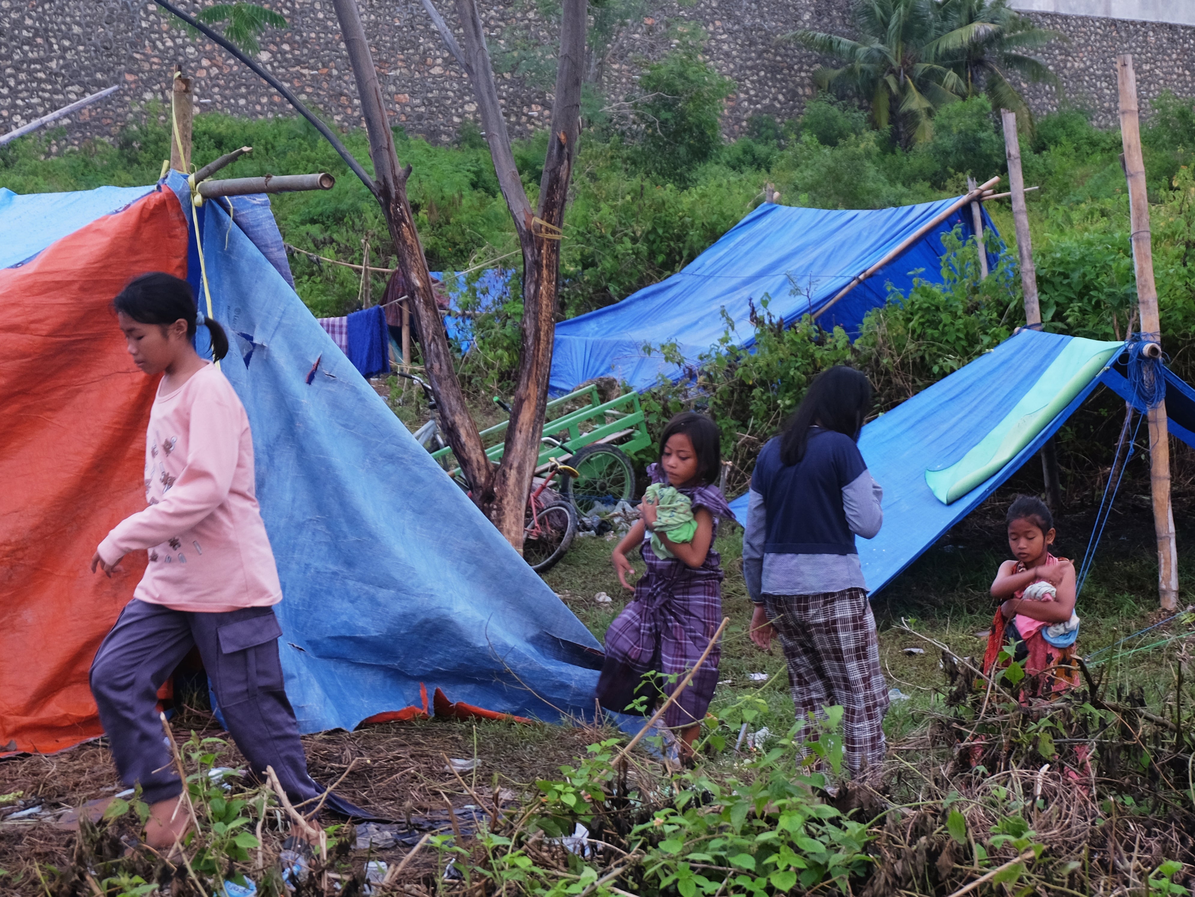 Evacuees are living in refugee camps after the earthquake that struck Majene, West Sulawesi several days ago