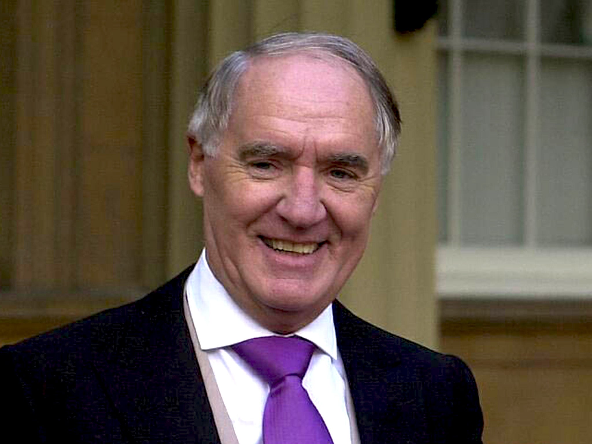 After receiving his knighthood at Buckingham Palace in 2000