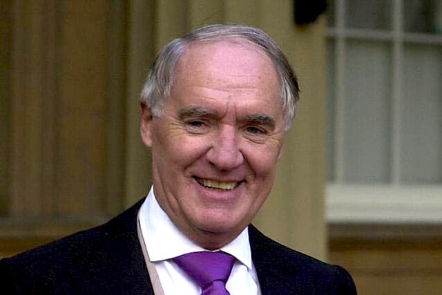 <p>After receiving his knighthood at Buckingham Palace in 2000</p>