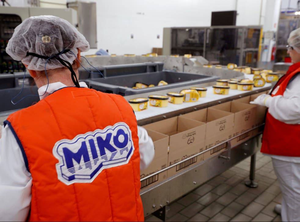 <p>Workers at Miko Carte d’Or, part of Unilever, in Saint-Dizier, France</p>