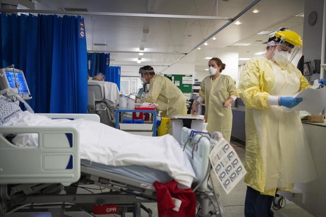 <p>Nurses treat patients in the ICU (Intensive Care Unit) at St George’s Hospital in Tooting, southwest London</p>