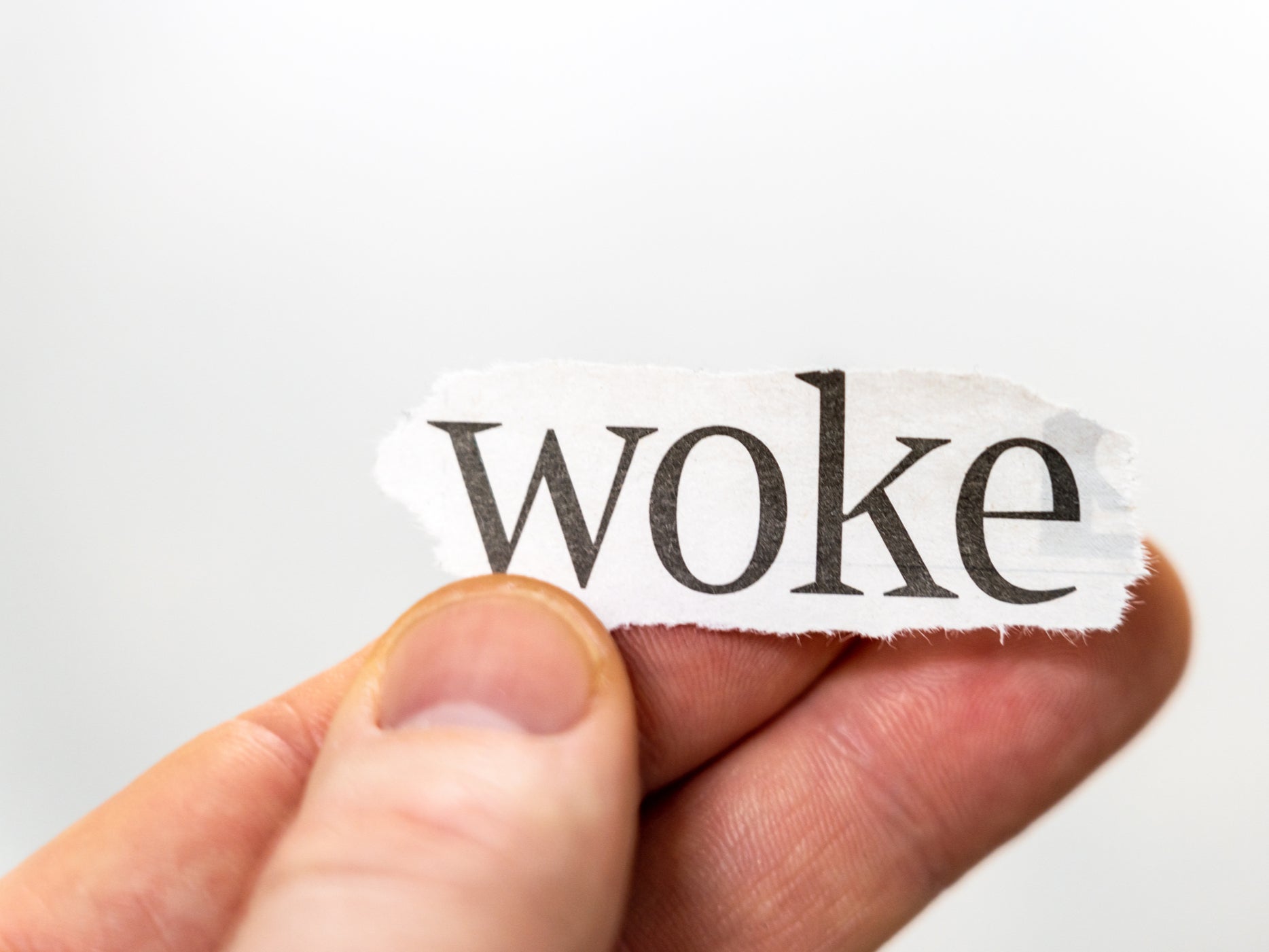 <p>The word ‘woke’ originated in African American Vernacular English to refer to being ‘woken up to’ or alert to issues around racial injustice</p>