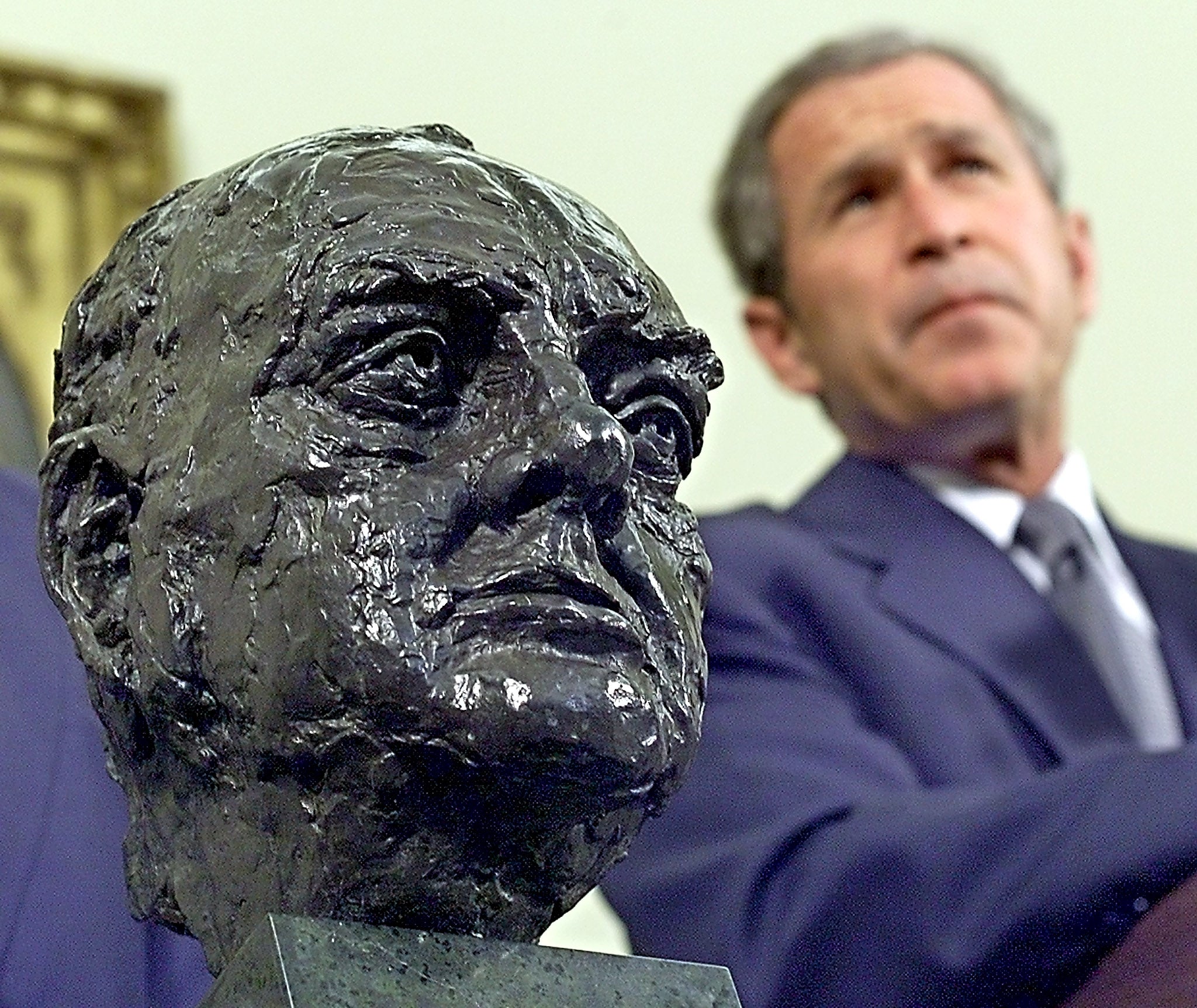<p>George W Bush received the bust of Sir Winston Churchill from the British Ambassador in 2001</p>