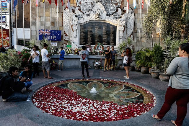 <p>File Image: People gather at the Bali Bombing Memorial Monument on 12 October 2013 in Kuta, Bali, Indonesia. People gathered at various memorial ceremonies today to remember the victims of the 2002 Kuta nightclub bombings which killed 202 people</p>