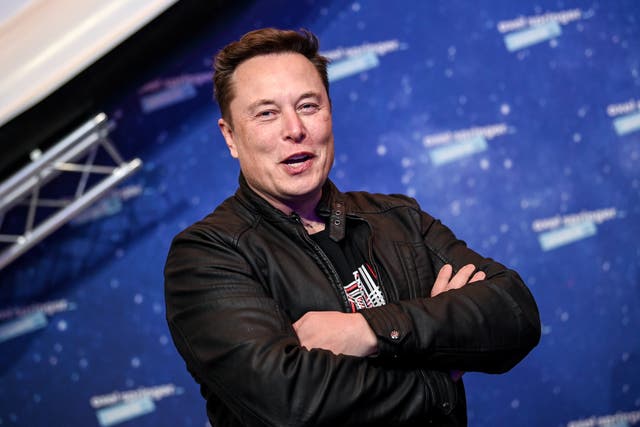 SpaceX owner and Tesla CEO Elon Musk arrives on the red carpet for the Axel Springer award, in Berlin, Germany on 01 December 2020