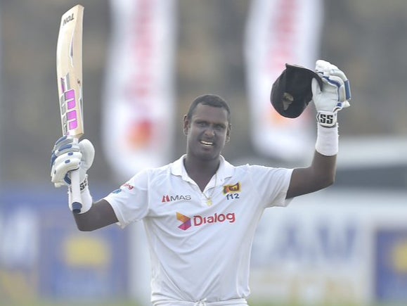 Angelo Mathews celebrates his century for Sri Lanka