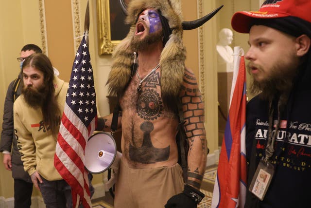 <p>Jacob Chansley, seen here in his horns during the Capitol riot, now blames Donald Trump for his actions</p>