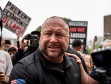 Conspiracy theorist Alex Jones loses bid to throw out defamation cases from Sandy Hook parents