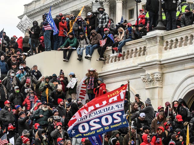 <p>Supporters of Donald Trump gather at the west entrance of the Capitol during a “Stop the Steal” protest outside of the Capitol building in Washington DC on 6 January 2021</p>