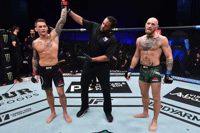 Dustin Poirier reacts after beating Conor McGregor