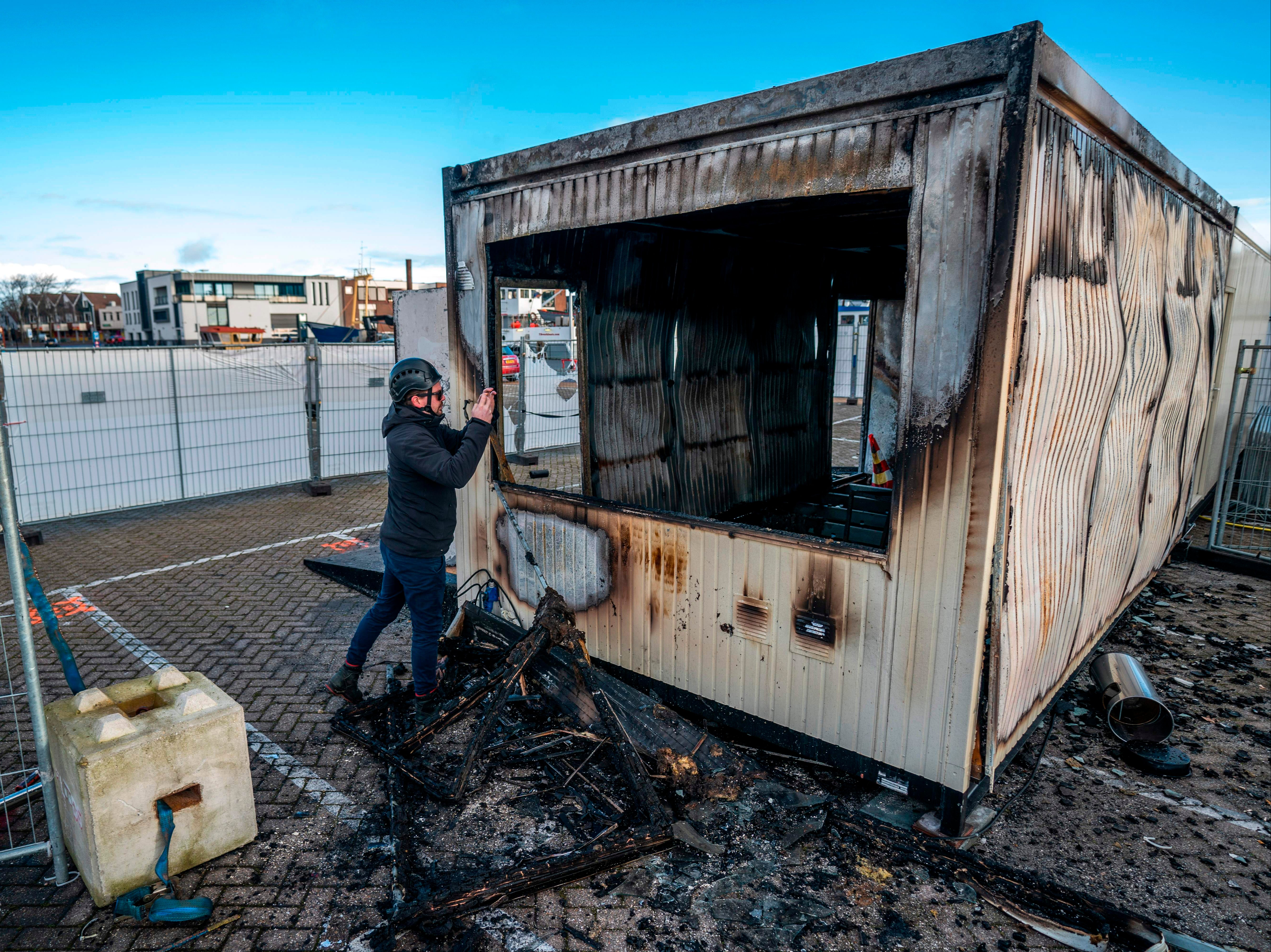 Riot police were called in as young rioters torched a coronavirus test centre in Urk