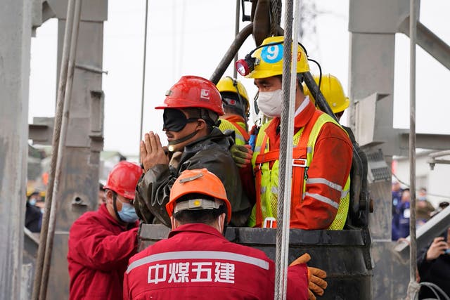 The death toll has risen to 10 after 22 Chinese miners were trapped underground