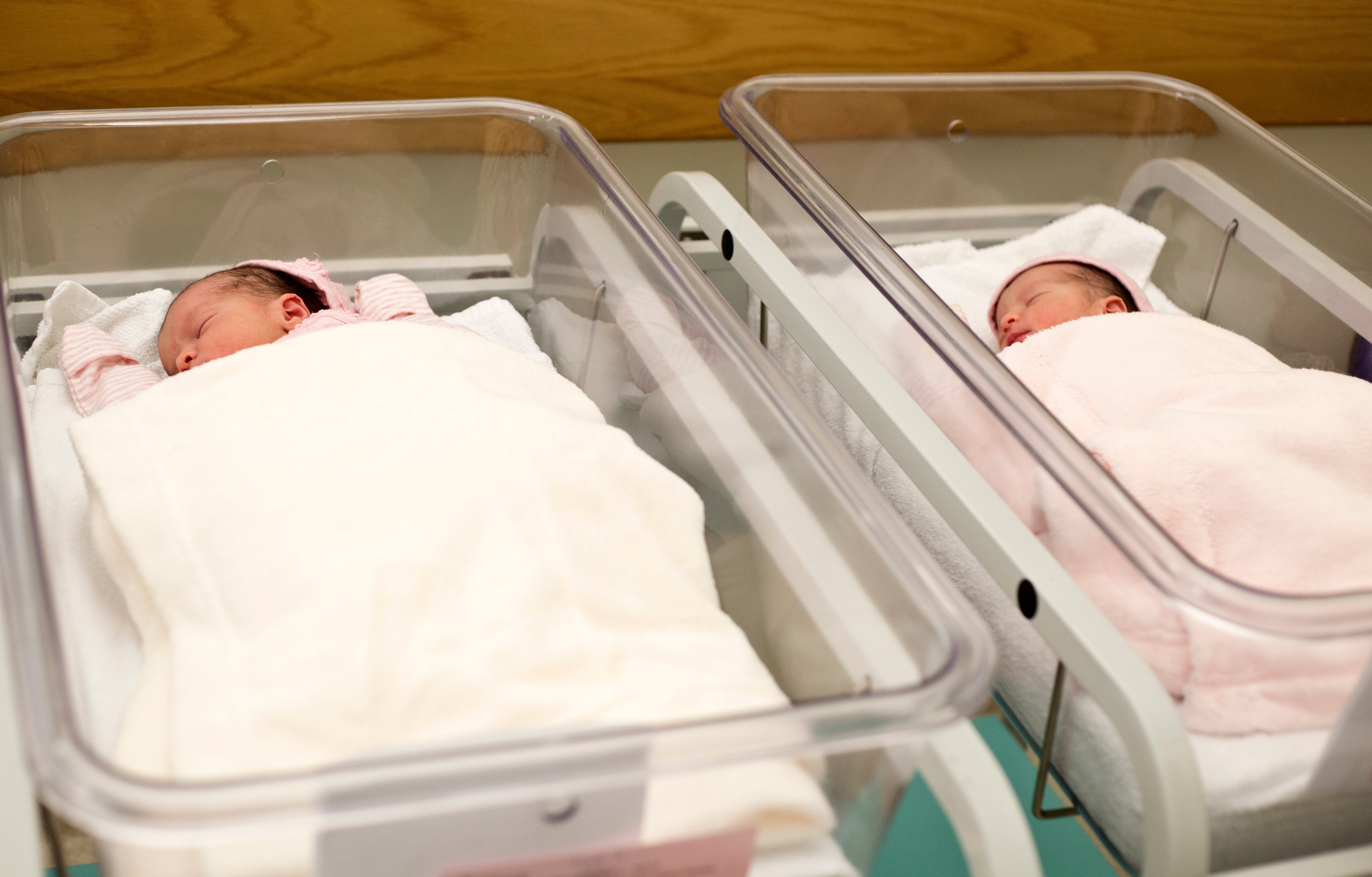 Parents must adopt biological children after using a surrogate