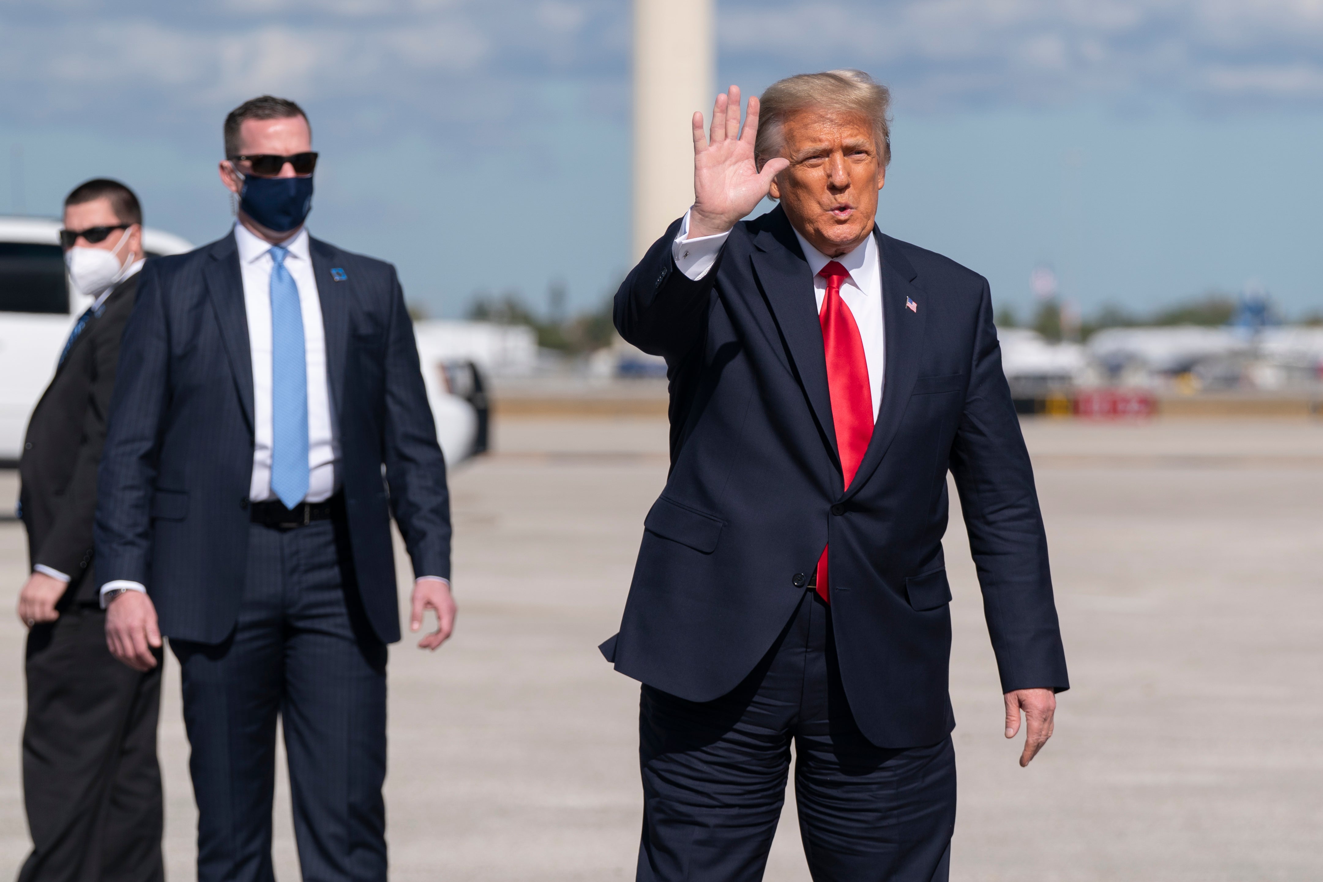 Former President Donald Trump arrives at Palm Beach International Airport in Florida after leaving the White House