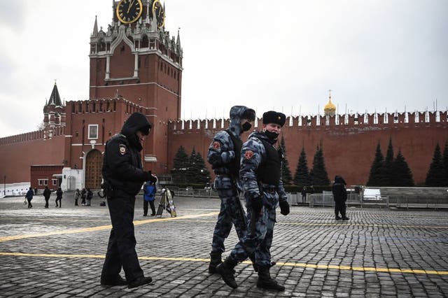 <p>Russian law enforcement officers patrol Red Square</p>