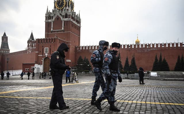 <p>Russian law enforcement officers patrol Red Square</p>