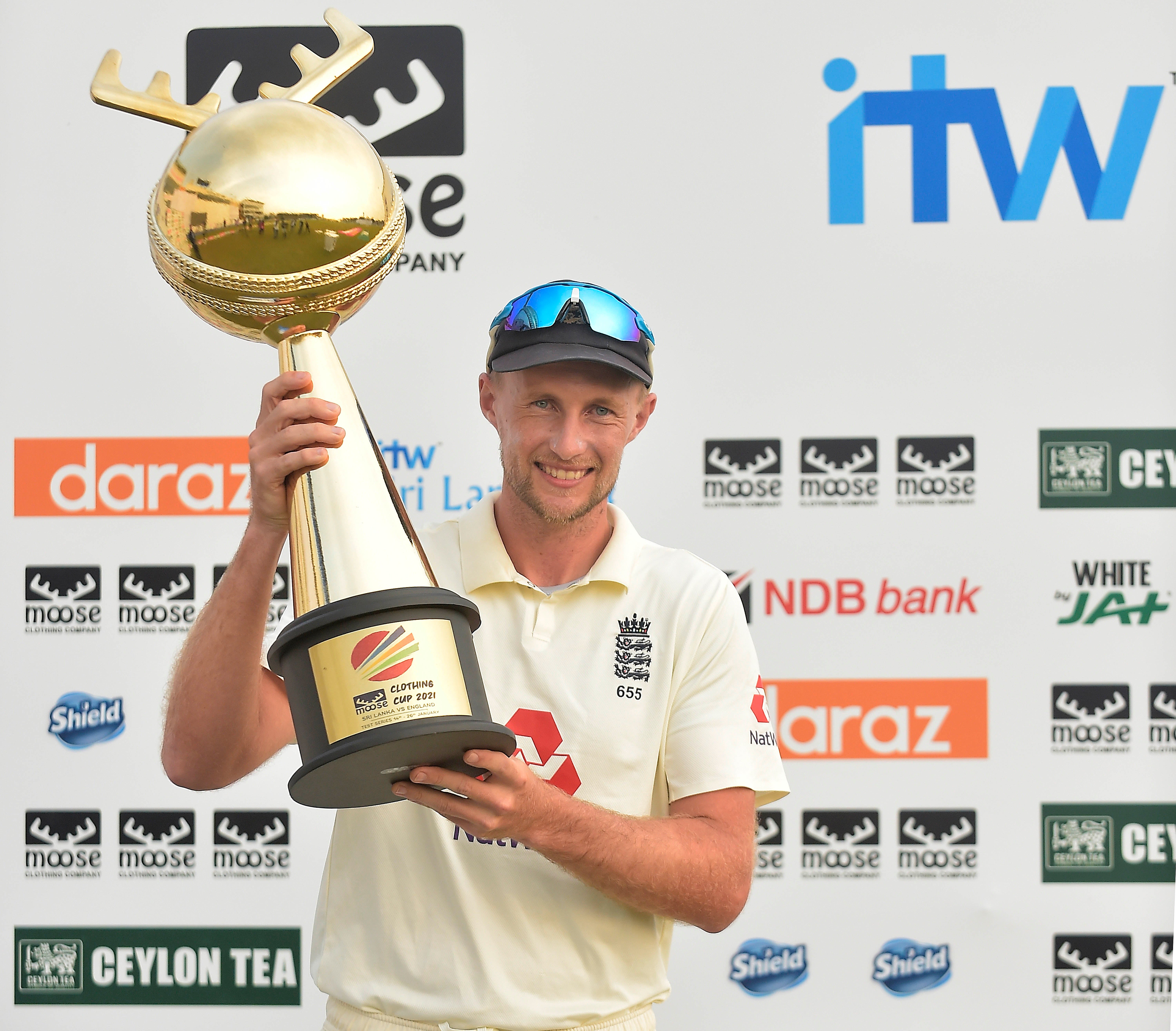 Joe Root, the England captain holds the ‘Moose Clothing Cup 2021’ trophy