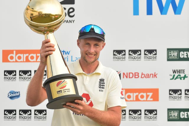 <p>Joe Root, the England captain holds the ‘Moose Clothing Cup 2021’ trophy</p>