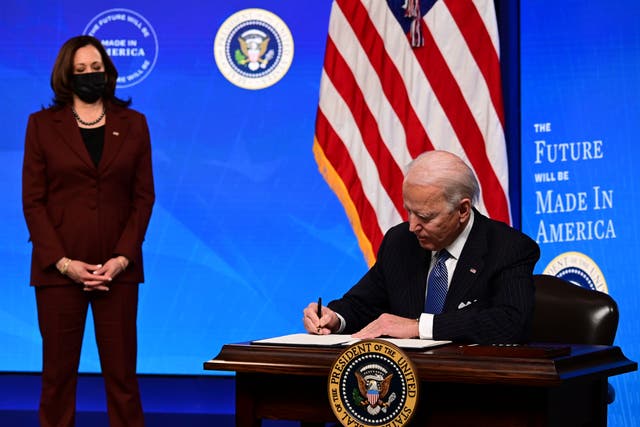 <p>President Joe Biden with Vice President Kamala Harris signs a “Made in America” Executive Order, to increase the amount of federal spending that goes to US companies</p>