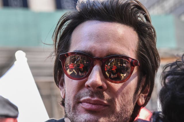 <p>Brandon Straka, founder of the ‘WalkAway’ movement, attends a rally in support of Donald Trump near Trump Tower on 23 March, 2019</p>