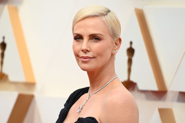 <p>Charlize Theron arrives for the 92nd Oscars at the Dolby Theatre in Hollywood, California on 9 February 2020</p>