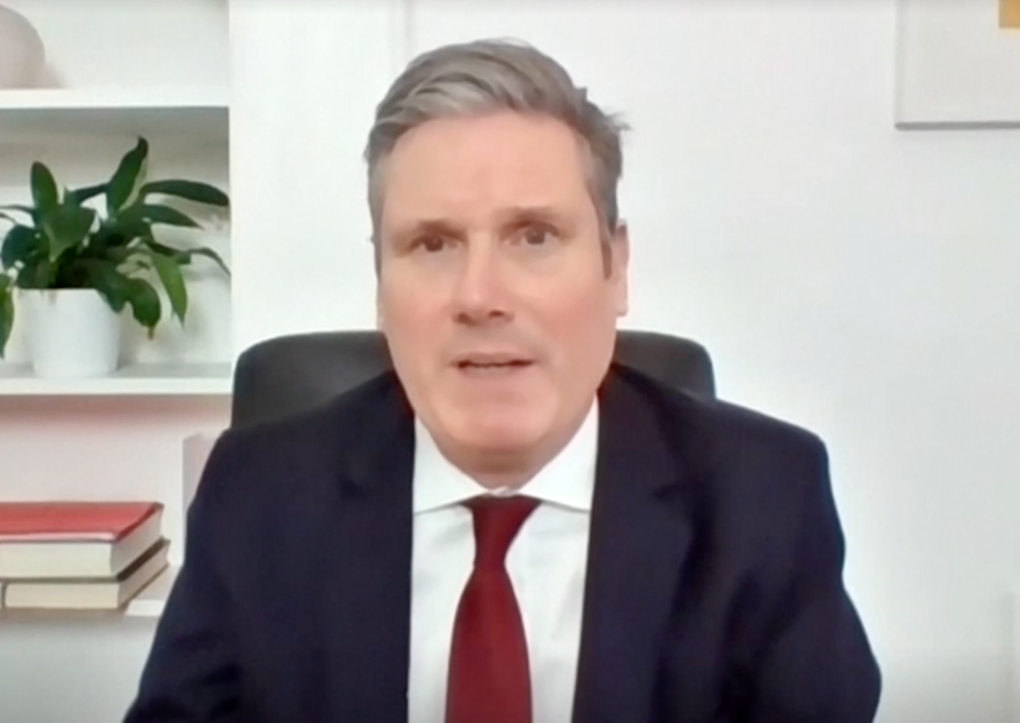 Keir Starmer, who usually looks worried, takes part in Prime Minister’s Questions by video