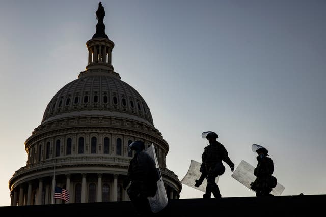 <p>Police patrol the US Capitol weeks after riot</p>