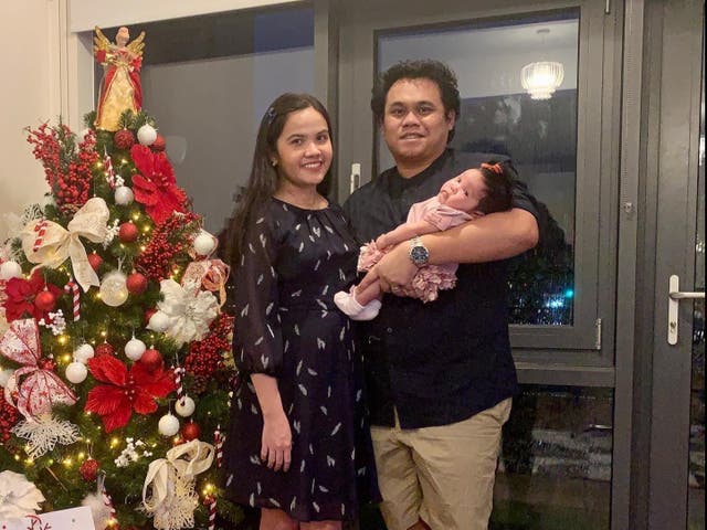 <p>&nbsp;Eva Gicain with her husband Limuel and baby Elleana</p>