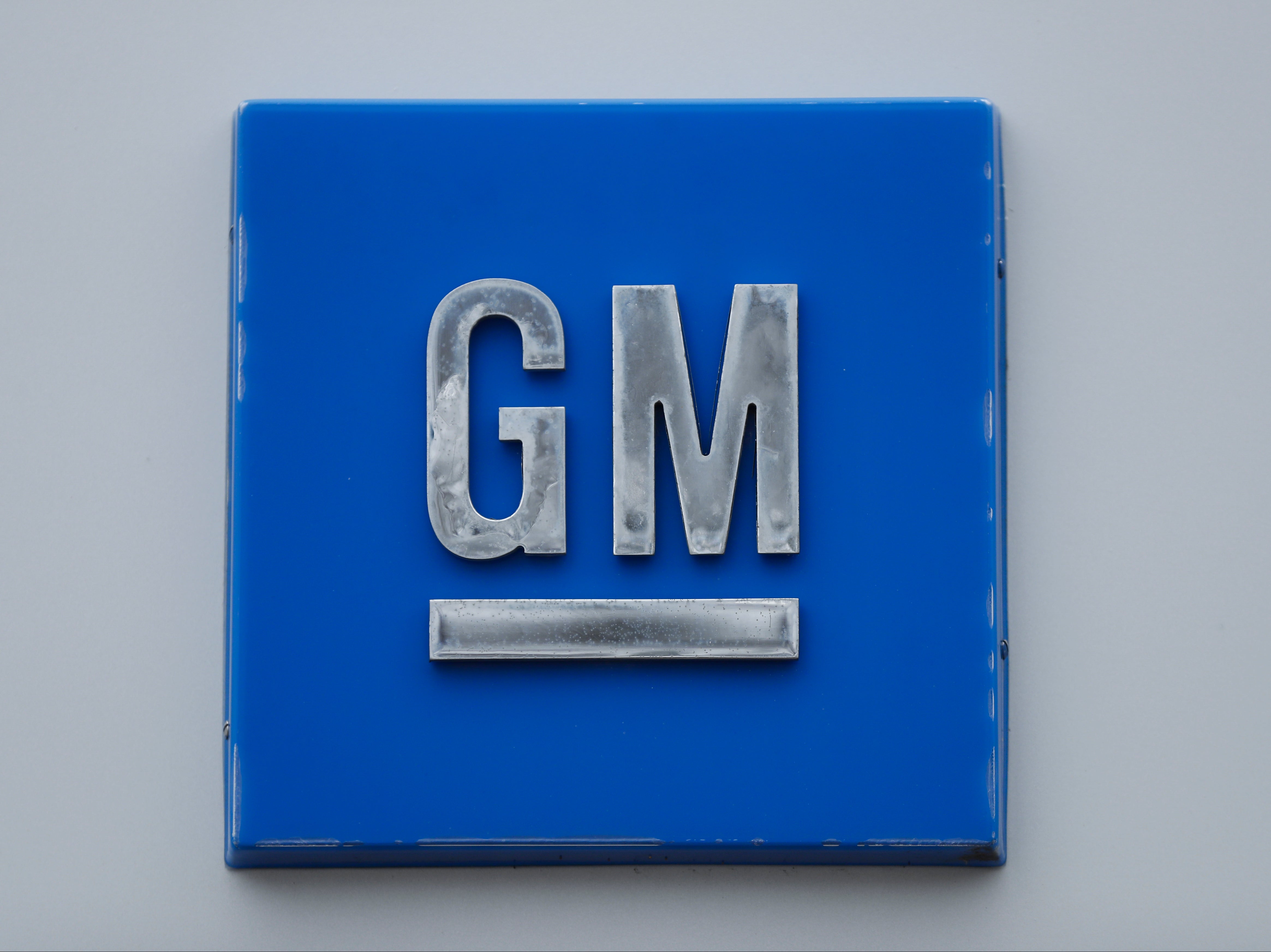 <p>&nbsp;A GM logo is shown at the General Motors Detroit-Hamtramck Assembly plant in Hamtramck, Michigan General Motors, the Detroit automaker making an aggressive push into electric vehicles, is establishing a goal of becoming carbon neutral in both its global products and its operations by 2040</p>