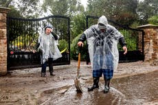 Atmospheric river storm drenches California, snow piles high