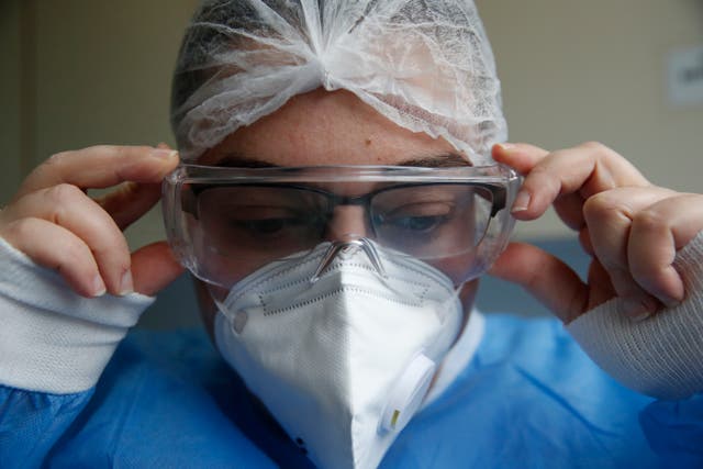Virus Outbreak Greece ICU Cleaners