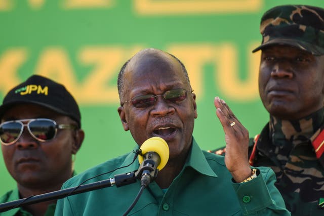 Tanzania’s then-incumbent President and presidential candidate of ruling party Chama Cha Mapinduzi (CCM) John Magufuli (centre) speaks during the official launch of the party’s campaign for the October general election at the Jamhuri stadium in Dodoma, Tanzania, on 29 August, 2020. The Tanzanian leader has suggested God will protect the country from coronavirus.