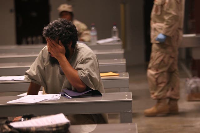 A detainee sits during a “life skills” class held for prisoners at Camp 6 in the Guantanamo Bay detention centre on March 30, 2010.