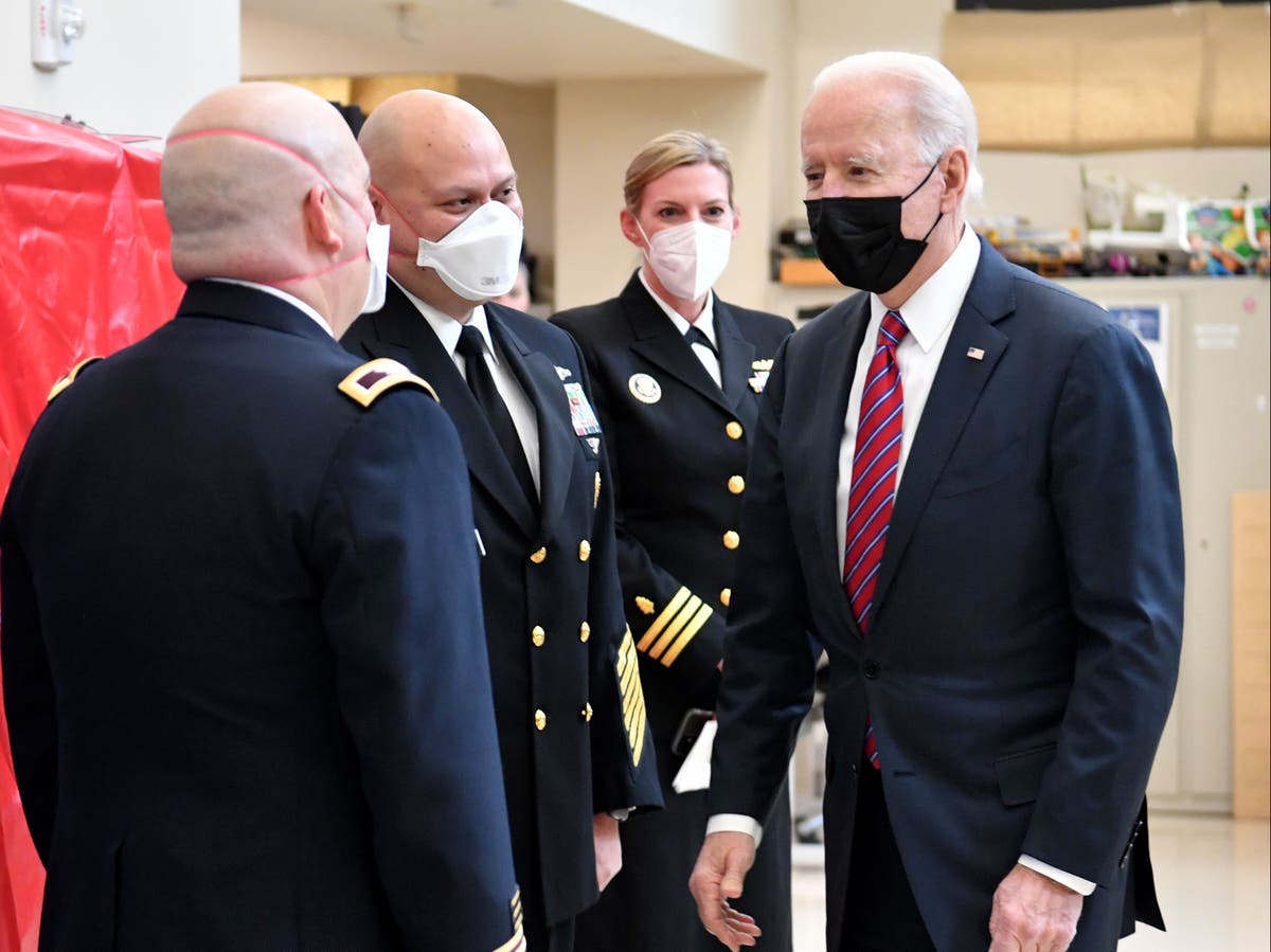 Biden visits wounded soldiers at Walter Reed, thanking staff for their service and caring for son Beau in 2015