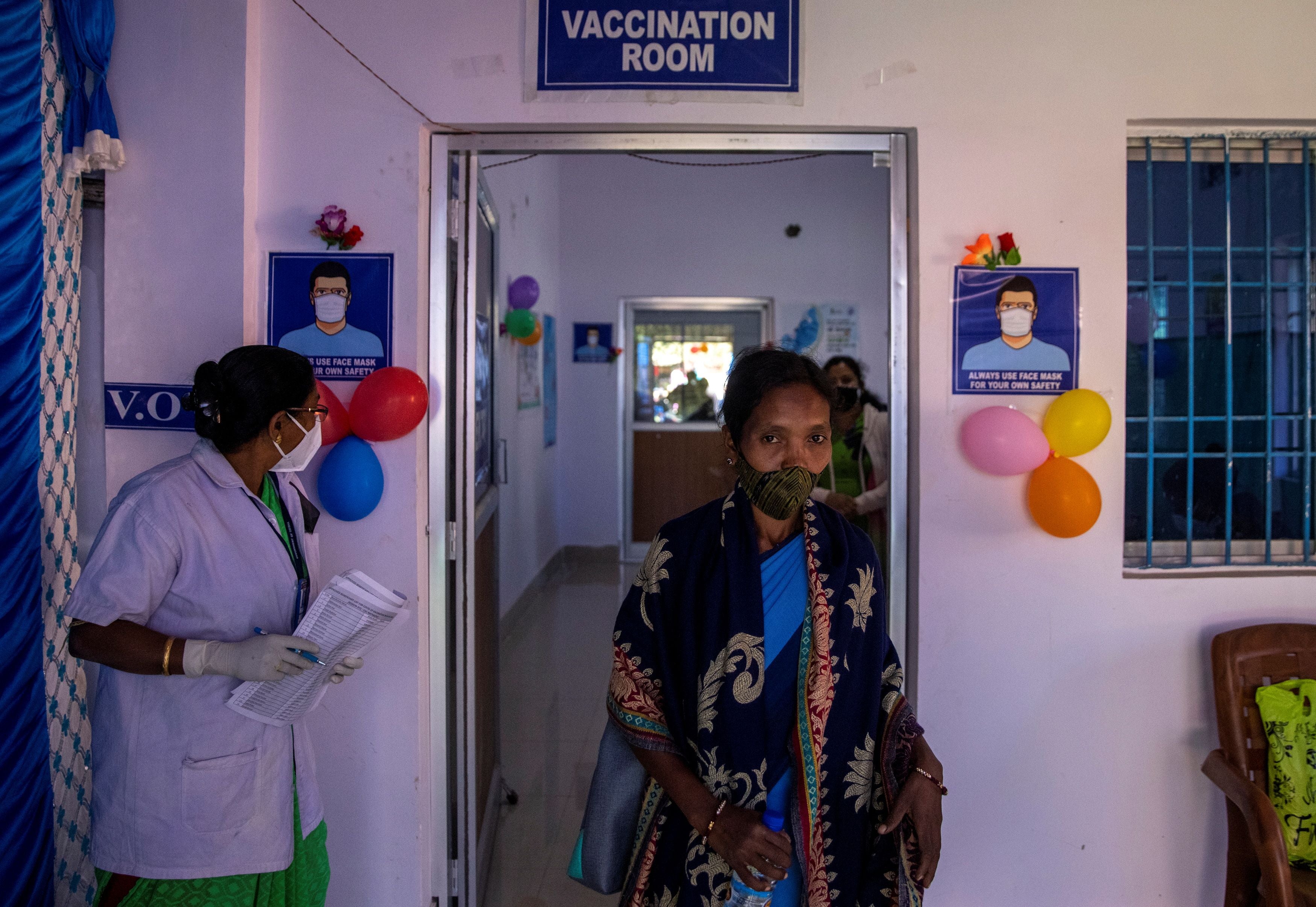 Reena Jani leaves Mathalput Community Health Centre after receiving the vaccine