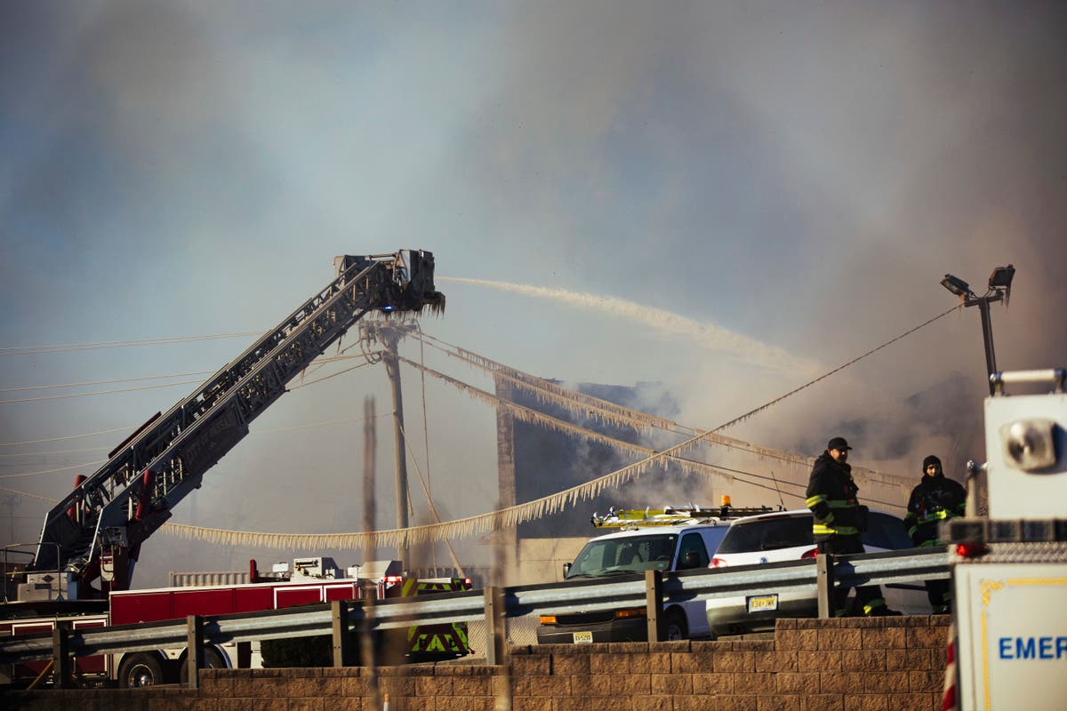 Crews battle flames, cold, wind in huge recycling plant fire wind plant ...
