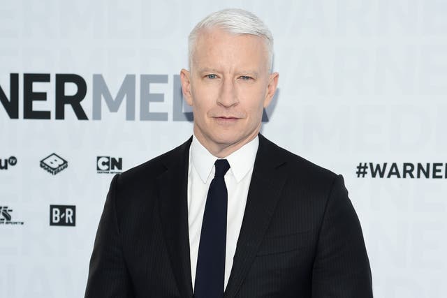 Former QAnon conspiracy theorist apologises to Anderson Cooper