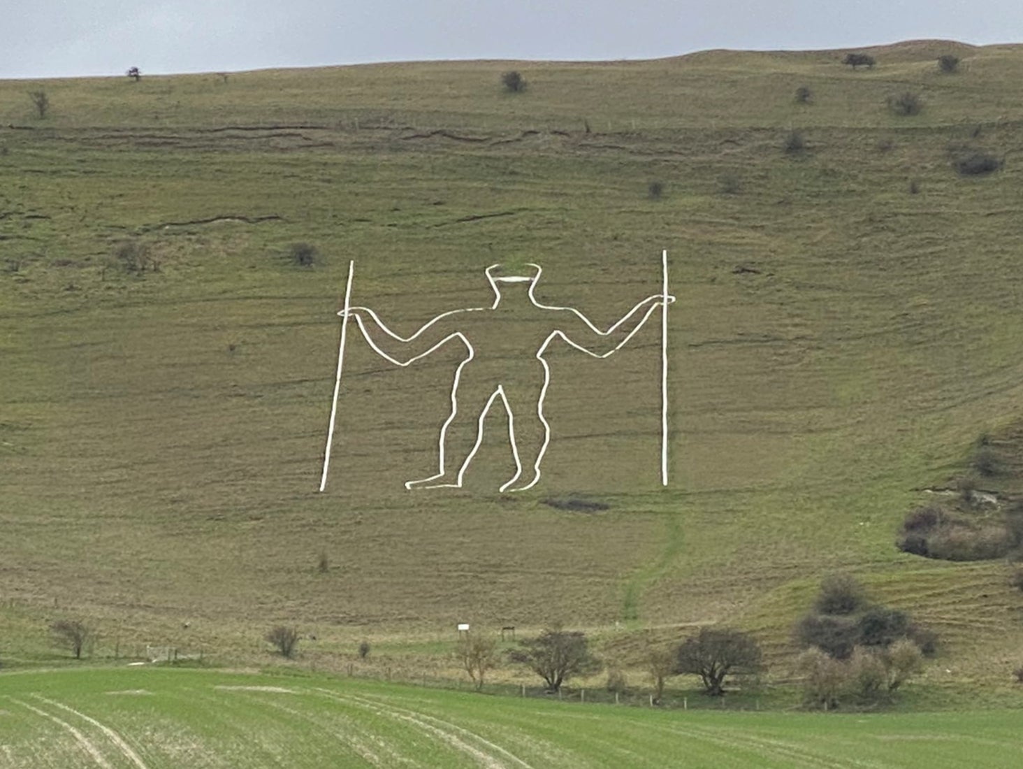 The mask was painted on the figure carved into the chalk hillside