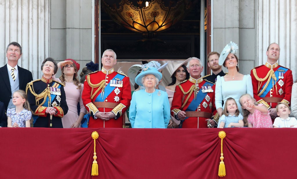 Members of the royal family watch the flypast on the balcony of Buckingham Palace during Trooping The Colour on 9 June 2018