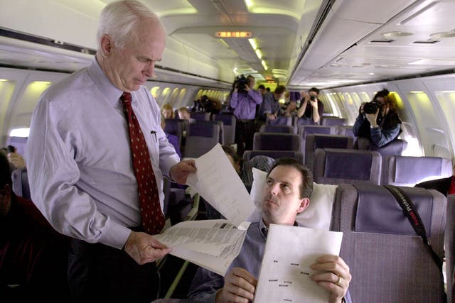 <p>The late US Senator and Republican presidential hopeful John McCain (L) looks over some documents with campaign advisor John Weaver (R) during the 2000 presidential campaign.</p>